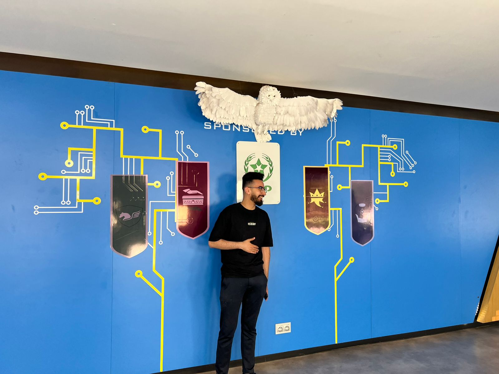 Mohamed at desk coding